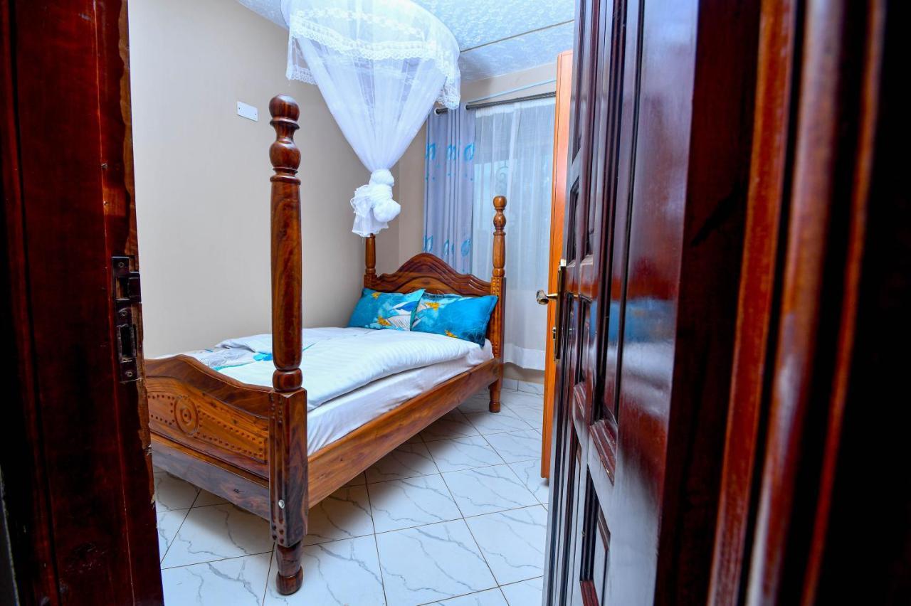 Peace Of Mind Suites Entebbe Exteriör bild
